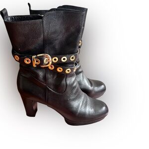 Chic Black Leather Heeled Boots with Gold Buckle